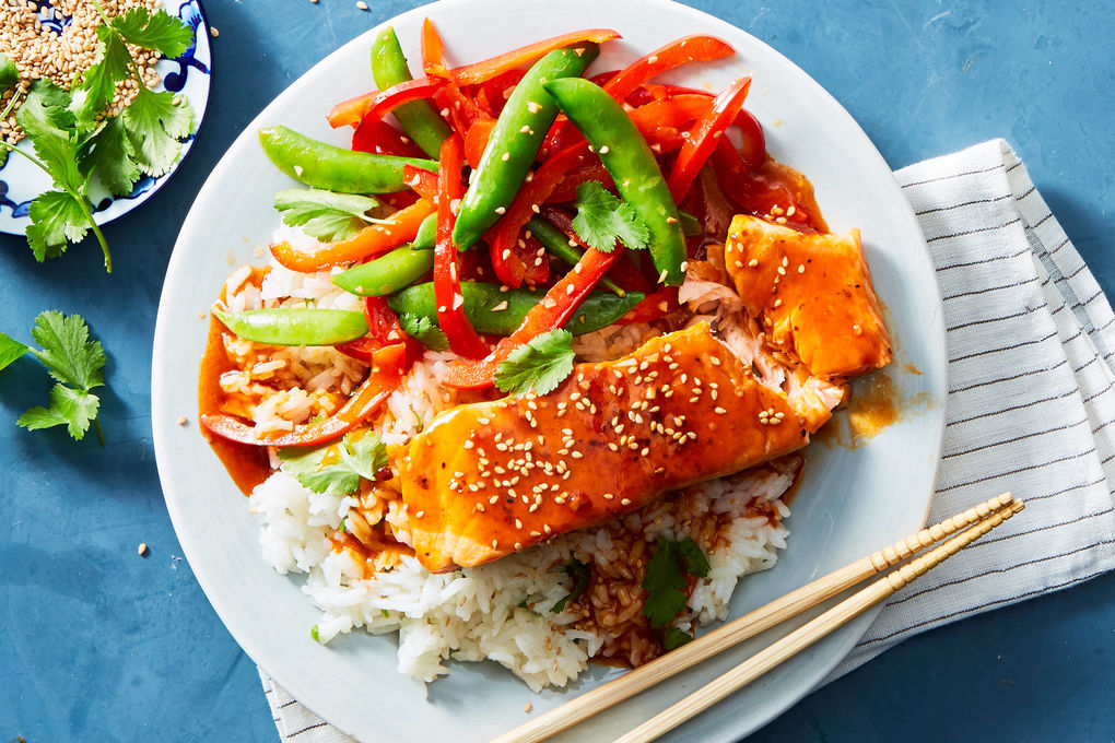 Tasteful BBQ Salmon meal with rice and fresh veggies